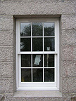 Obytný dům na Jersey - výsuvné okno